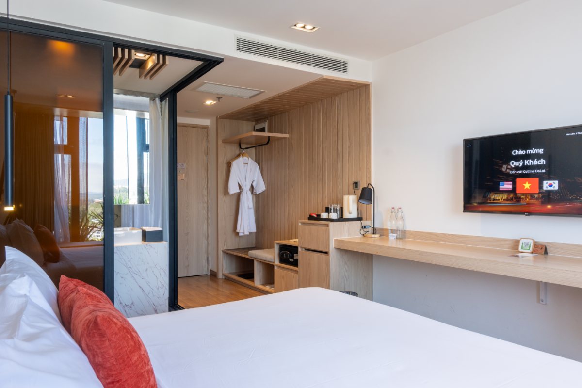 Bed in the Deluxe Double room at Colline Dalat