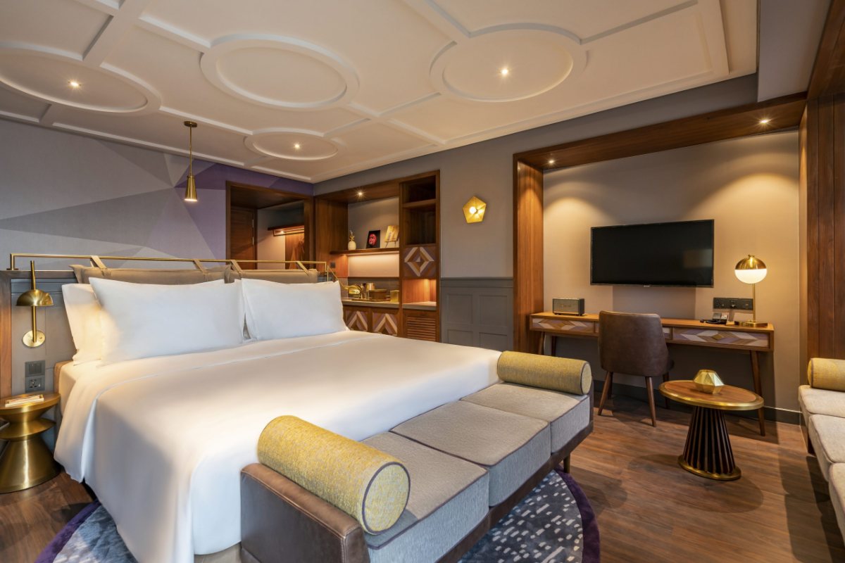 King bed in the Deluxe room at Fusion Original Saigon Centre