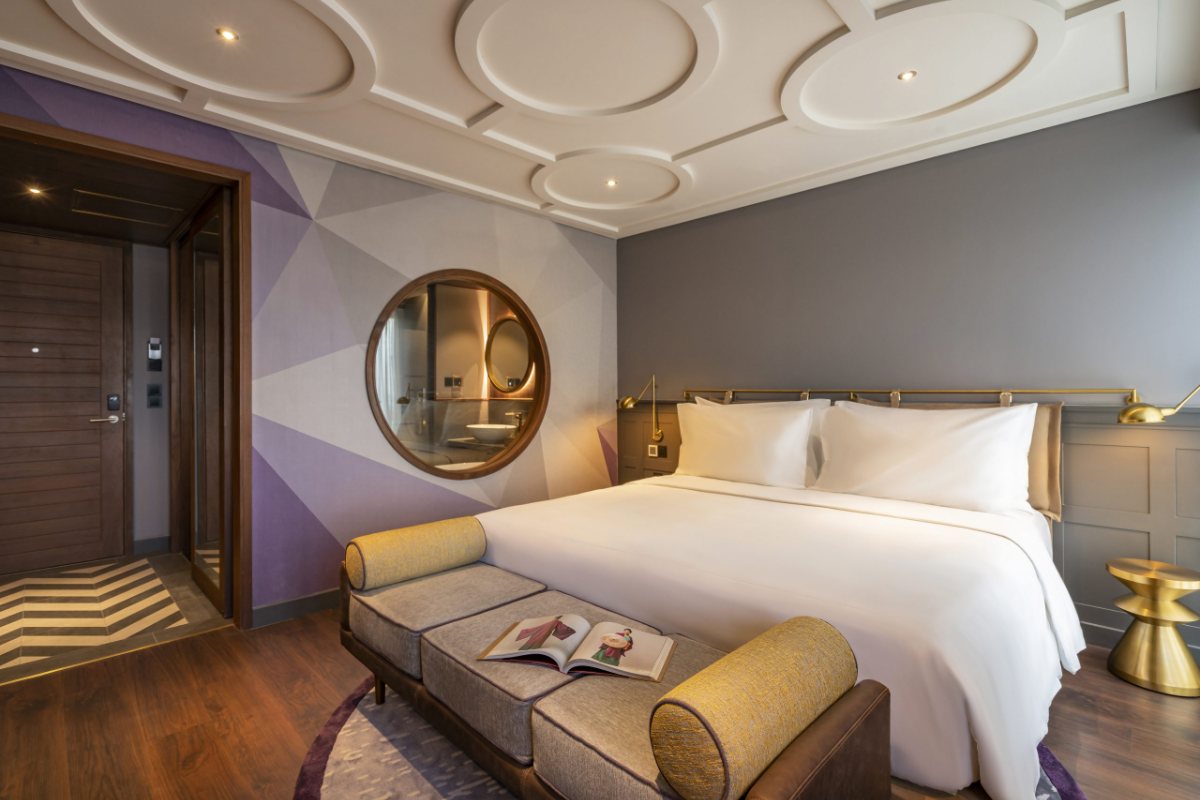 Premium Deluxe room with sofa at Fusion Original Saigon Centre