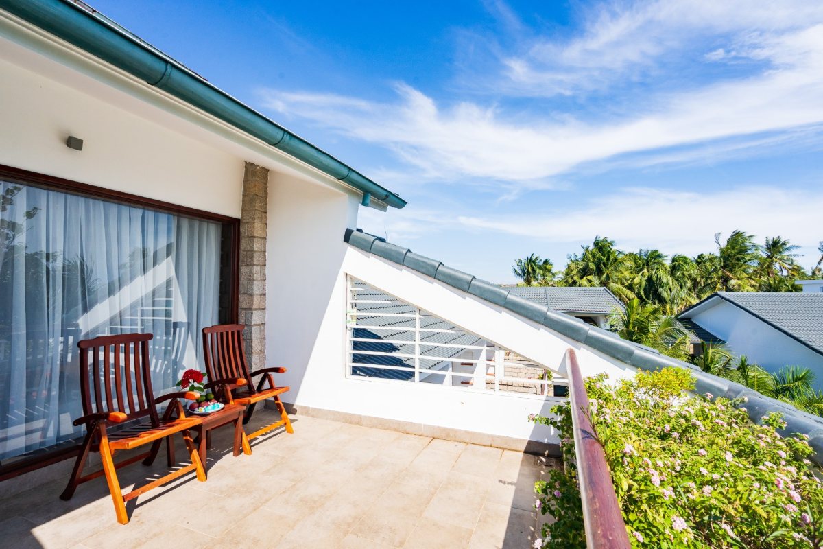 Hoang Ngoc Beach Resort Balcony with sea view in the Deluxe Ocean View room at Hoang Ngoc Beach Resort