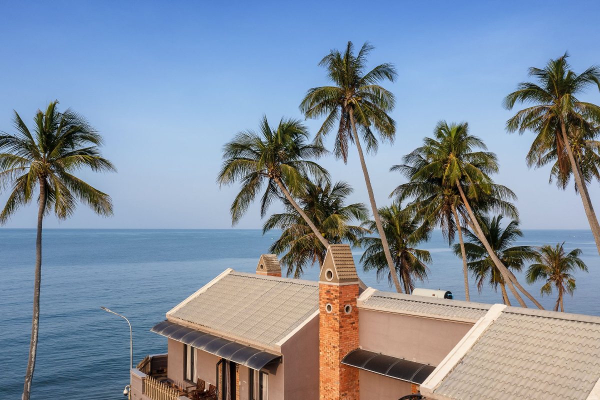 Le Viva Resort Mui Ne Coconut palms and sea view at Le Viva Resort Mui Ne