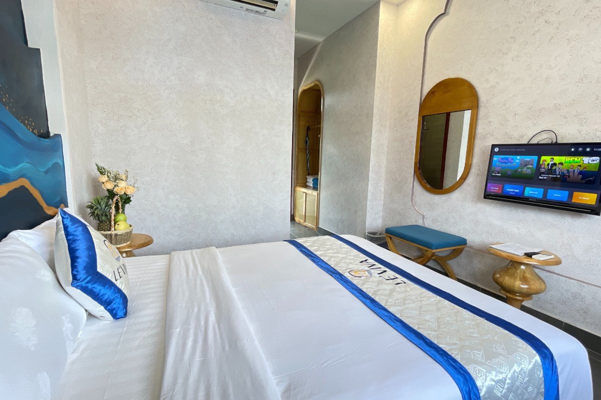 Double bed in the Deluxe Double room at Le Viva Resort Mui Ne