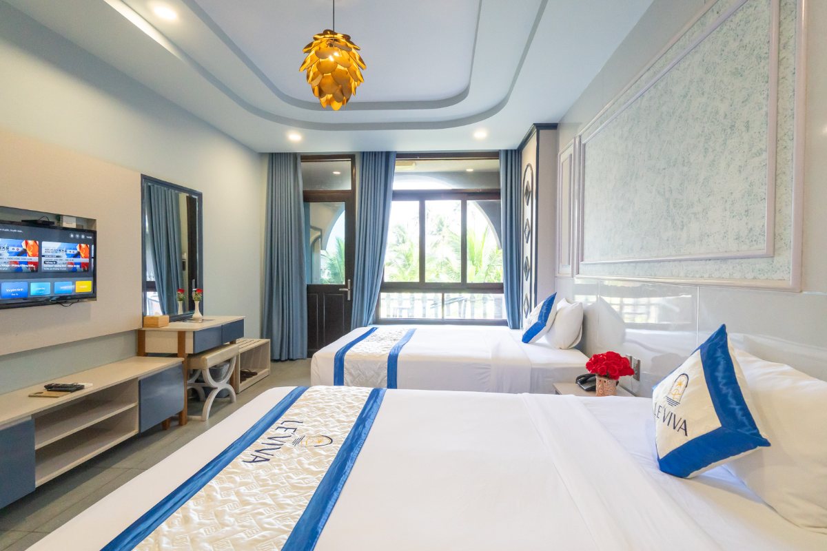 Two single beds in the Deluxe Twin room at Le Viva Resort Mui Ne