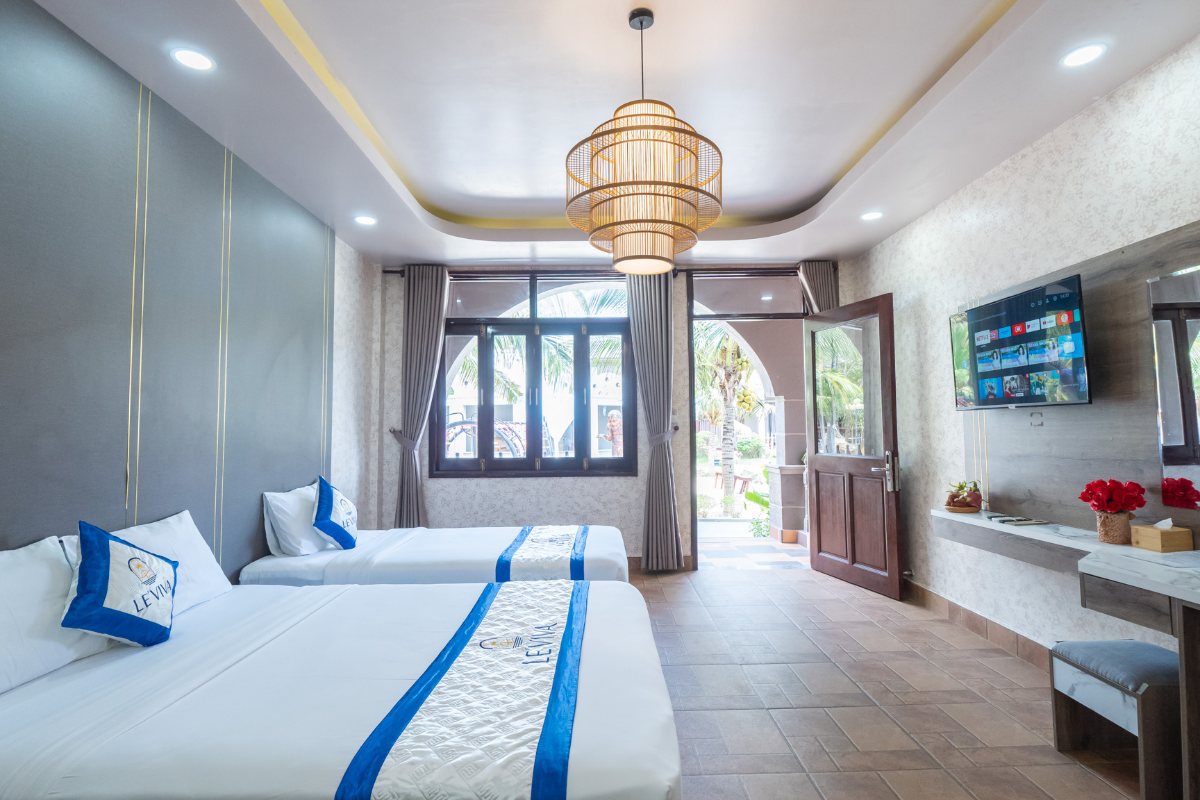 Triple room interior at Le Viva Resort Mui Ne