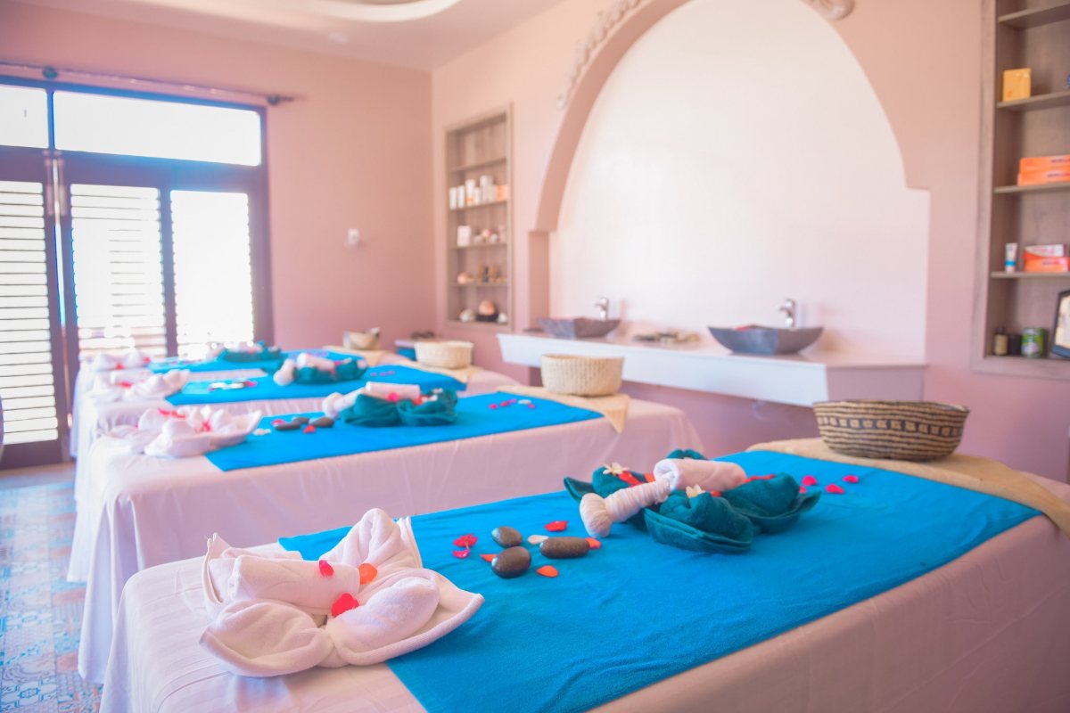 Bright interior with blue sofa at Le Viva Resort Mui Ne
