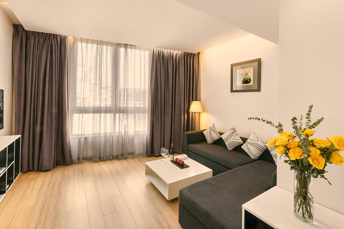 Suite sitting area with sofa at Liberty Central Saigon Centre