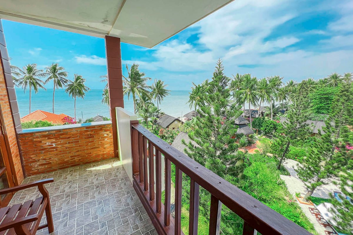 Balcony view from the Pool View room at Little Mui Ne Cottages