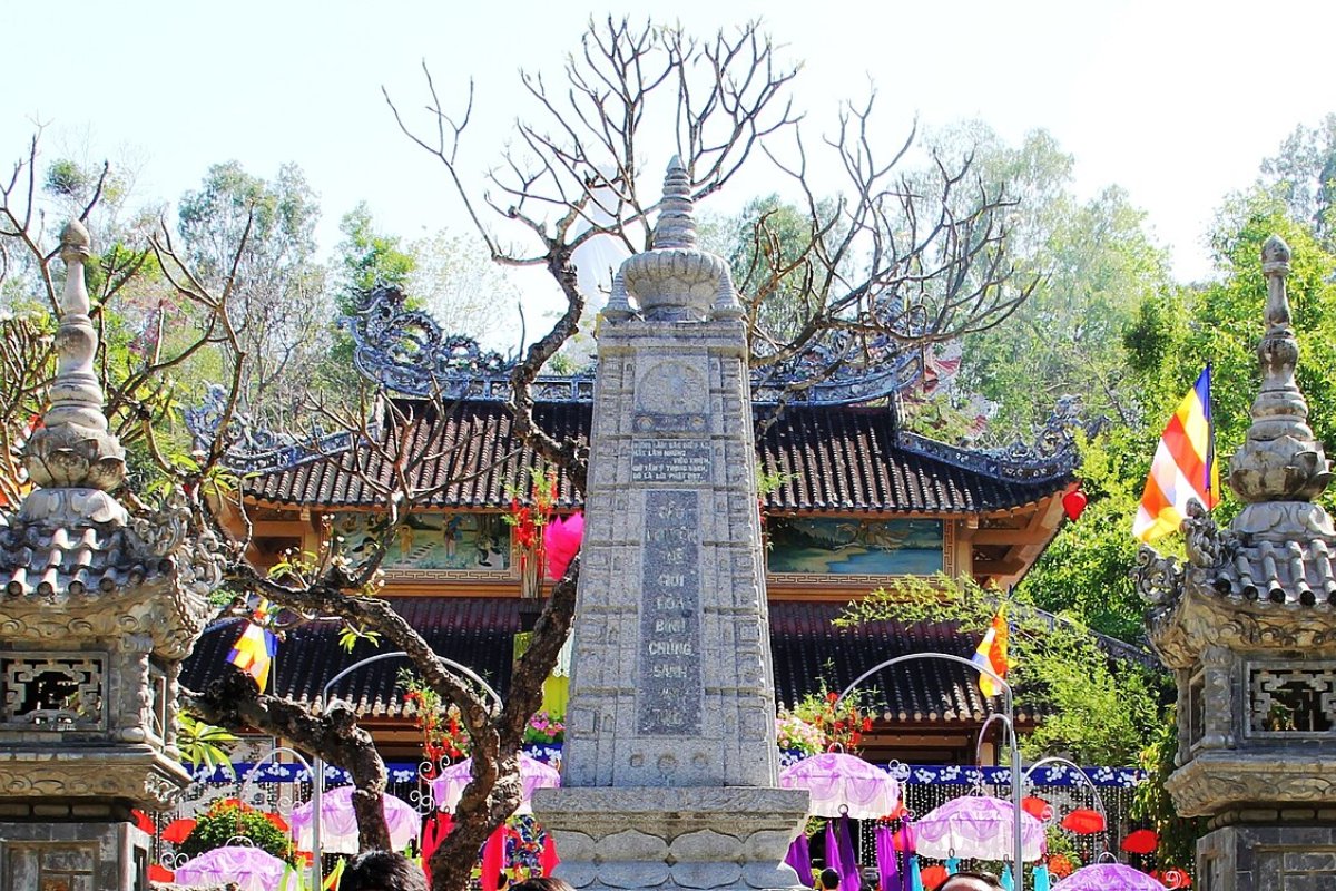 Halal Restaurants in Nha Trang 2026: 7 Verified Places by Area, from the Tourist Quarter to the Cham Kitchen Stone stupa and gateway at Long Son Pagoda in Nha Trang