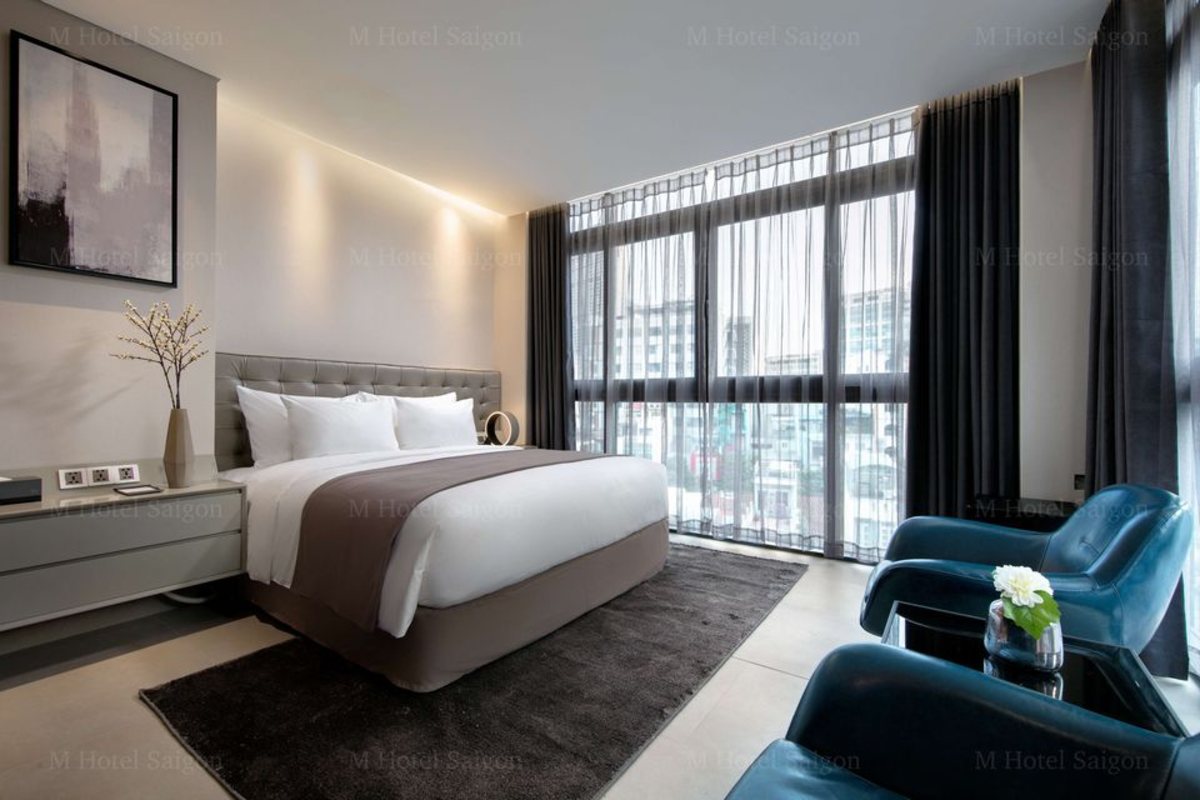 Contemporary Suite with king bed at M Hotel Saigon