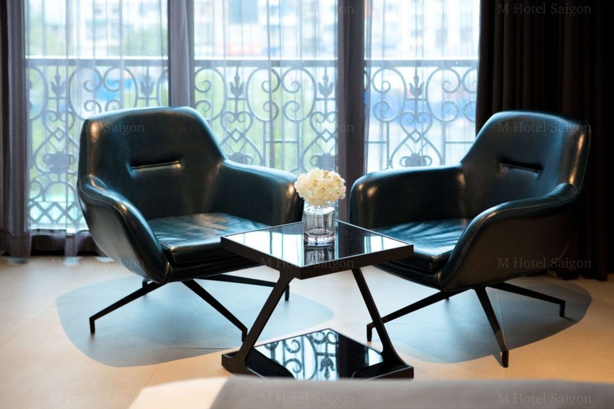 M Hotel Saigon Seating corner by the window in the Culture View Suite at M Hotel Saigon