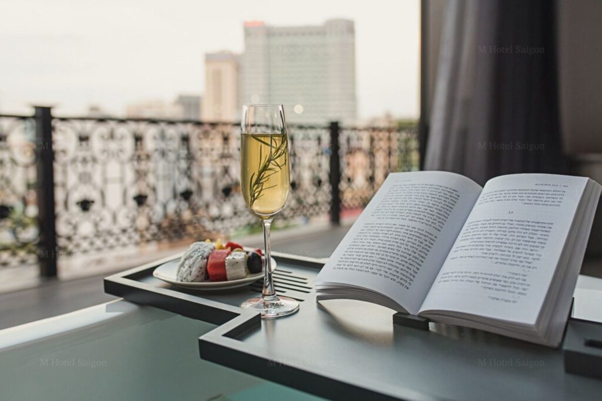Penthouse balcony over the Saigon skyline at M Hotel Saigon
