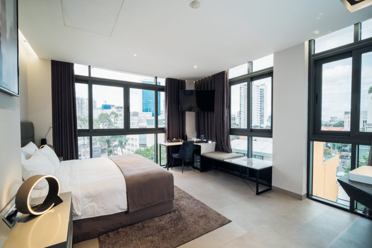 Guest room with city view at M Hotel Saigon