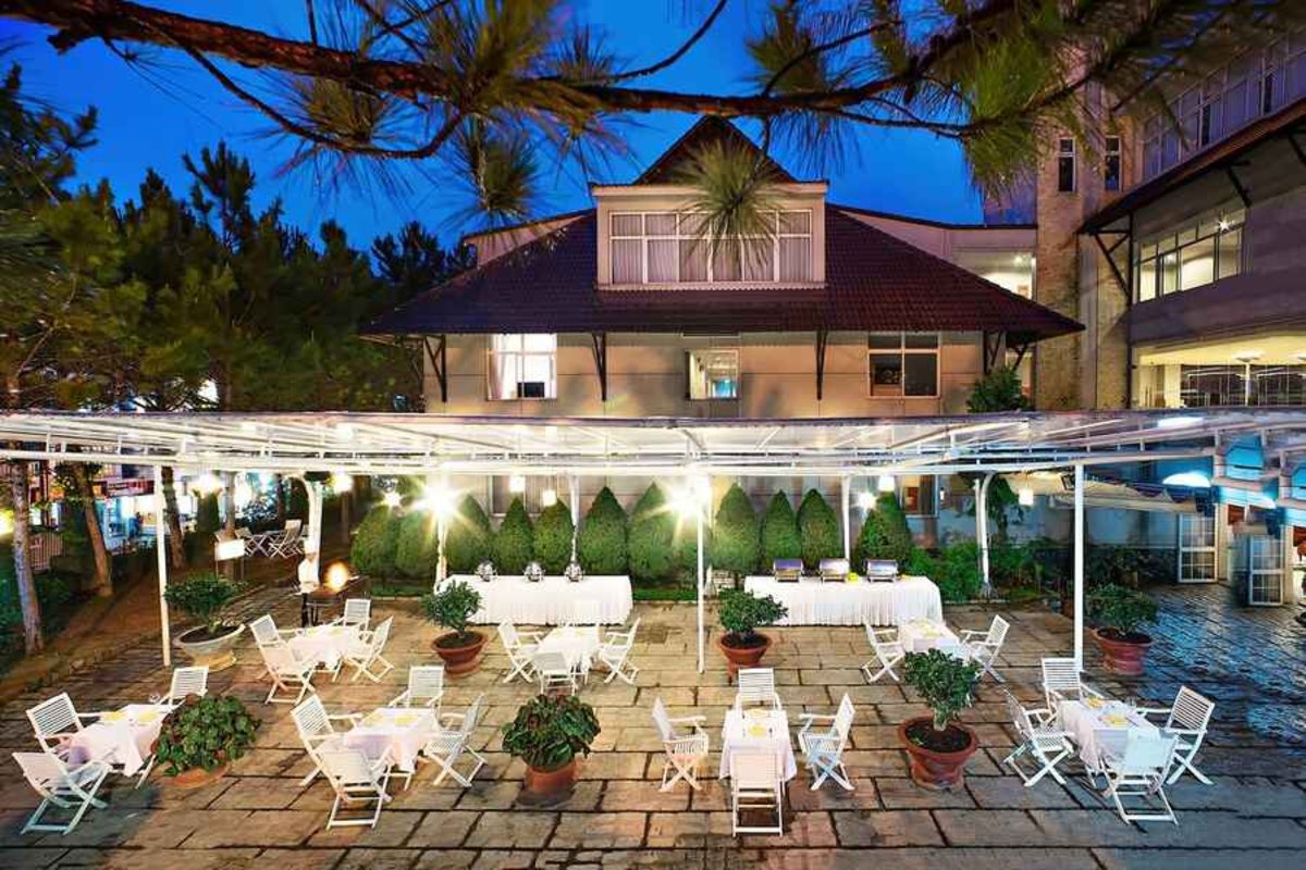Garden dining area at Muong Thanh Holiday Dalat