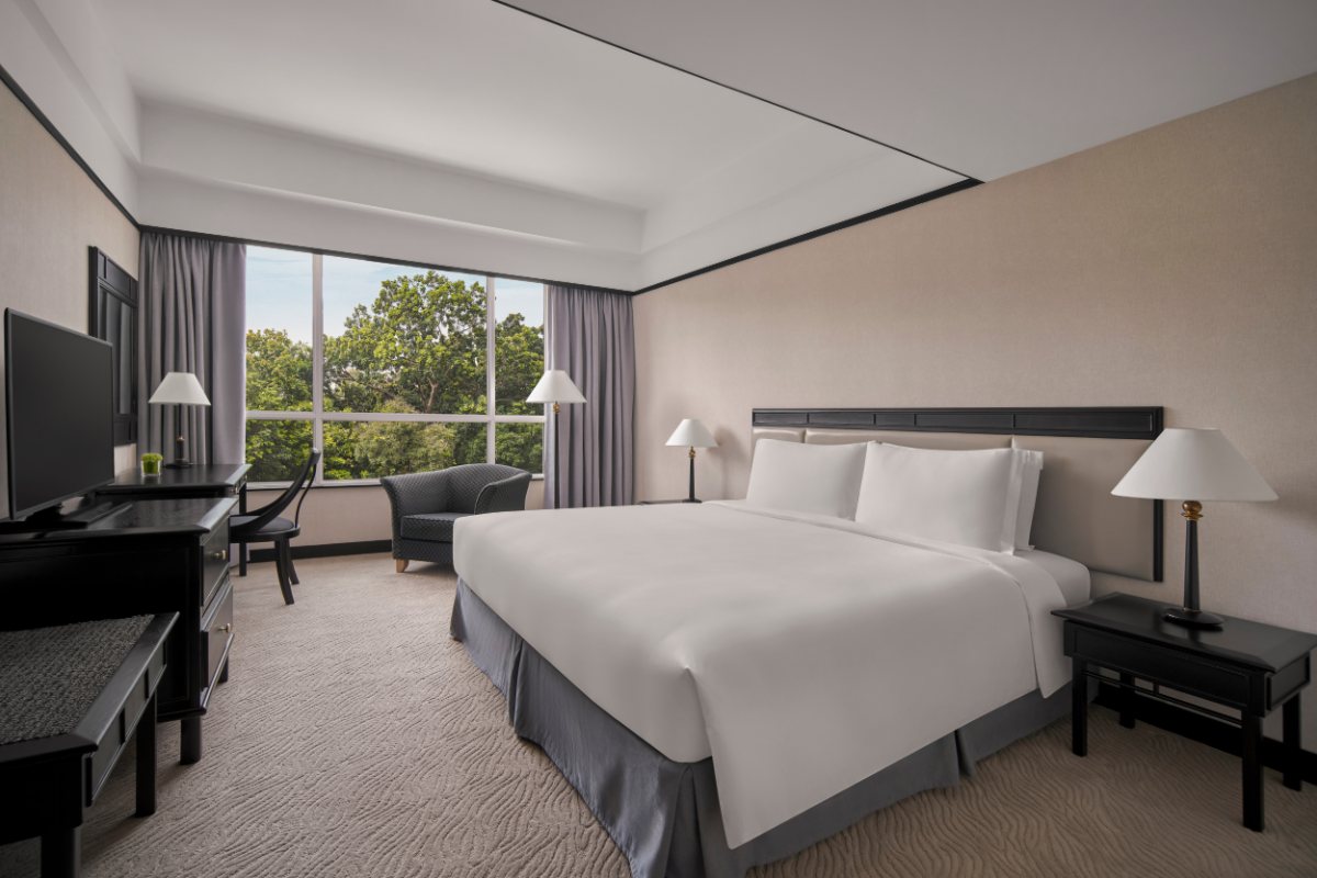 Deluxe Suite bedroom at New World Saigon Hotel