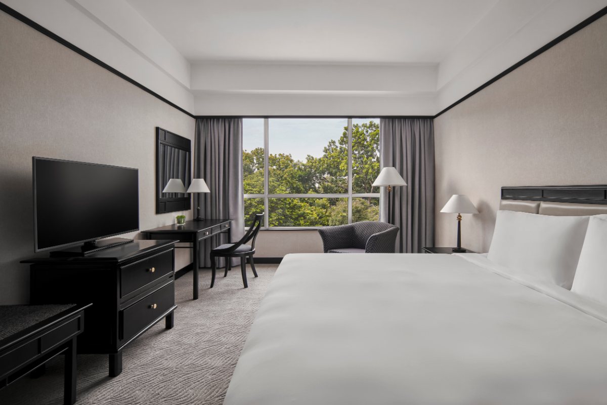 King bed in the Deluxe Suite at New World Saigon Hotel