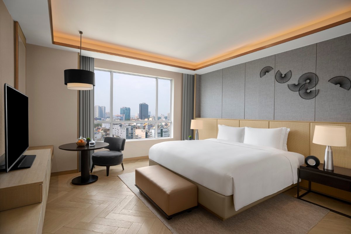 Director Suite bedroom at New World Saigon Hotel