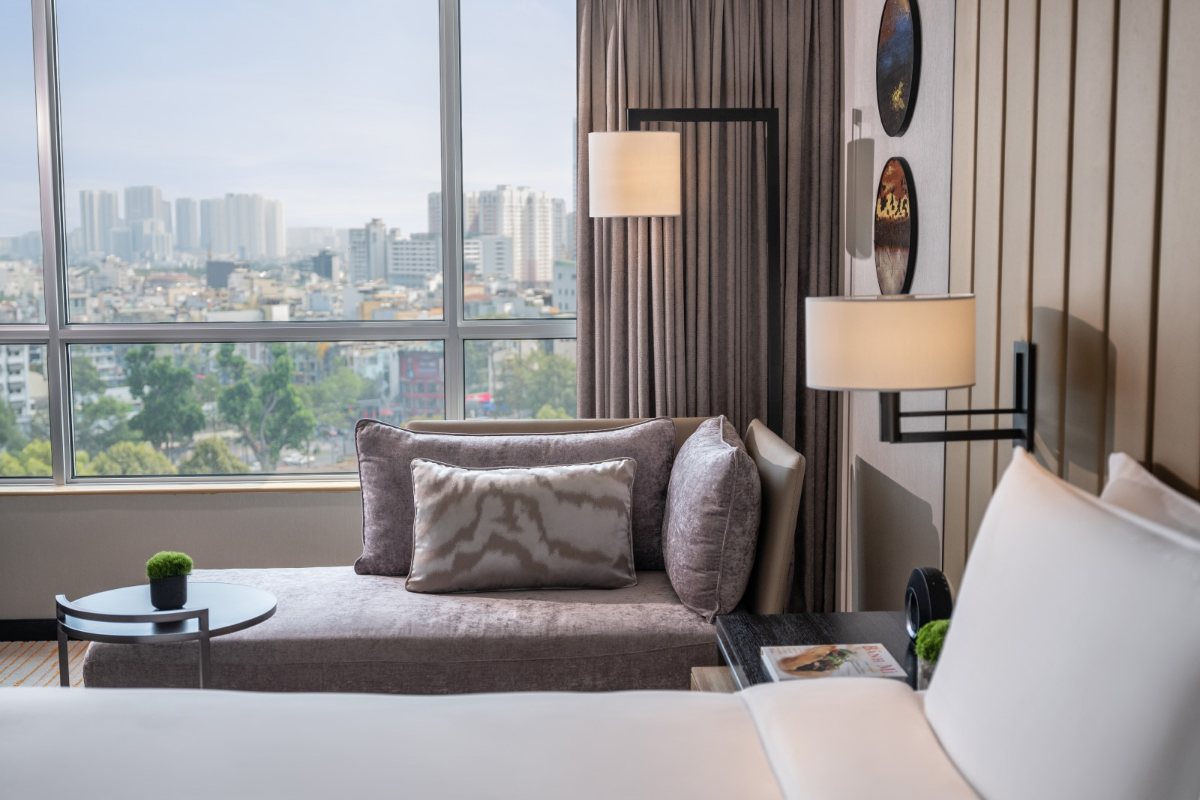 Residence Club room with sofa at New World Saigon Hotel