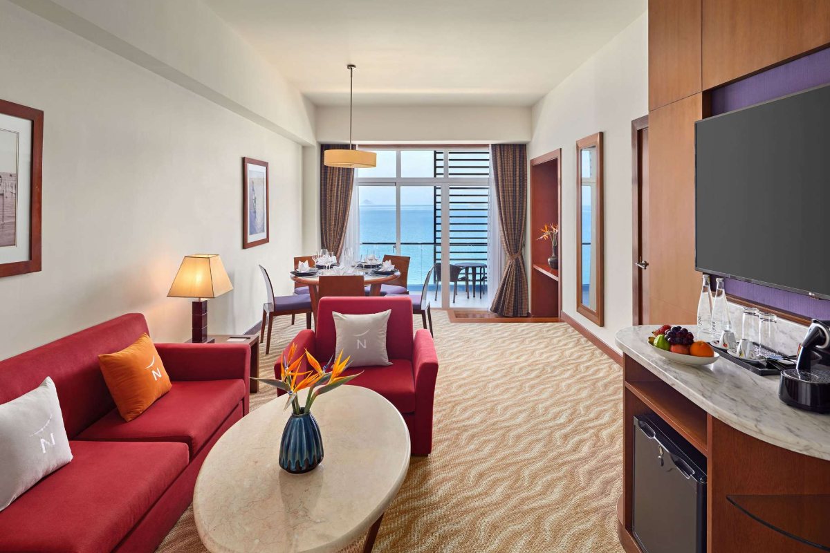 Sitting area in a Deluxe room at Novotel Nha Trang