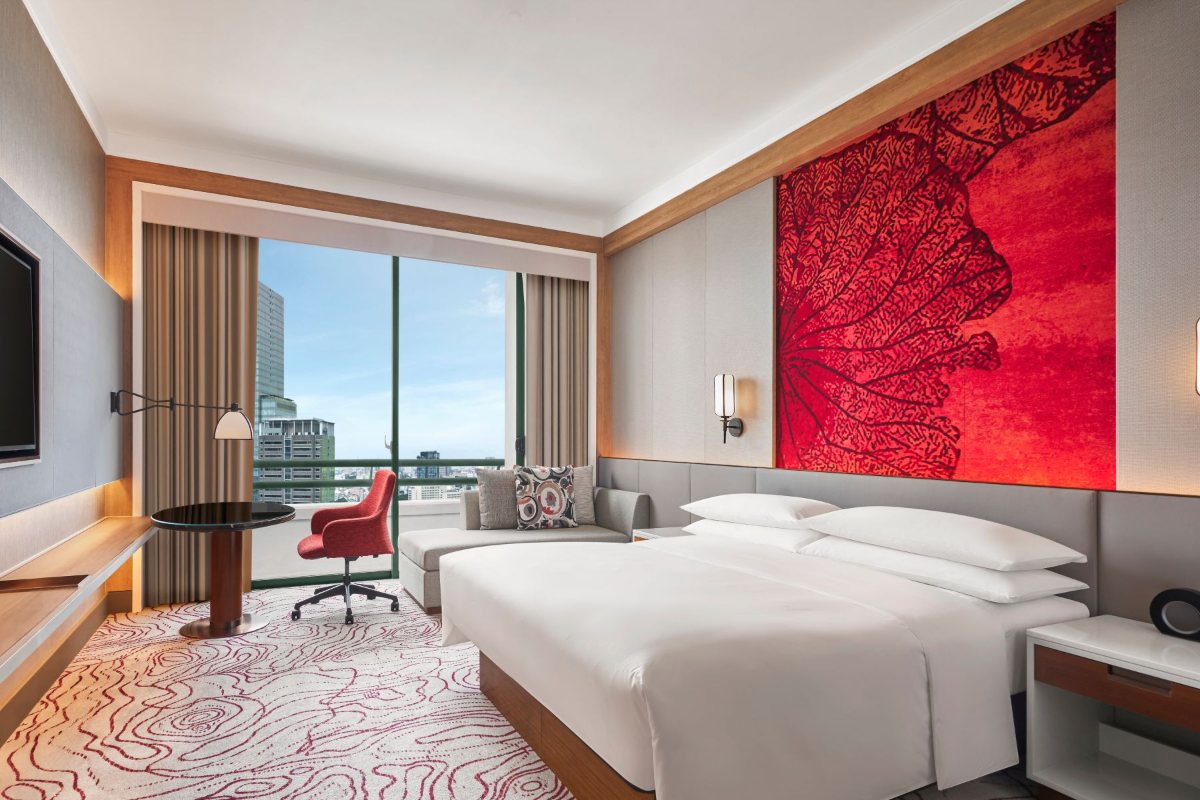 Club guest room with king bed at Sheraton Saigon Grand Opera Hotel