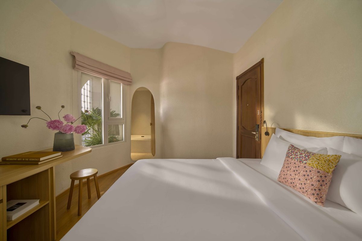 Double bed in the Signature Ben Thanh room