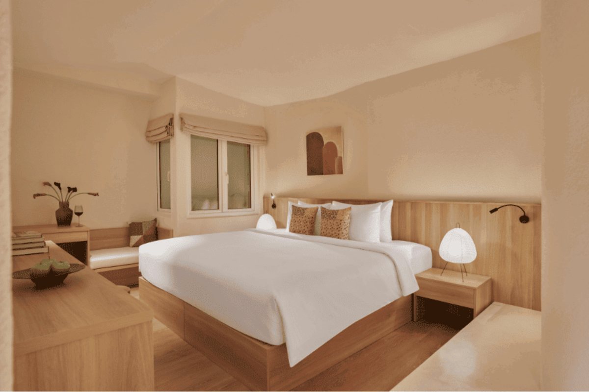King bed in the Spring Field room at Silverland Ben Thanh