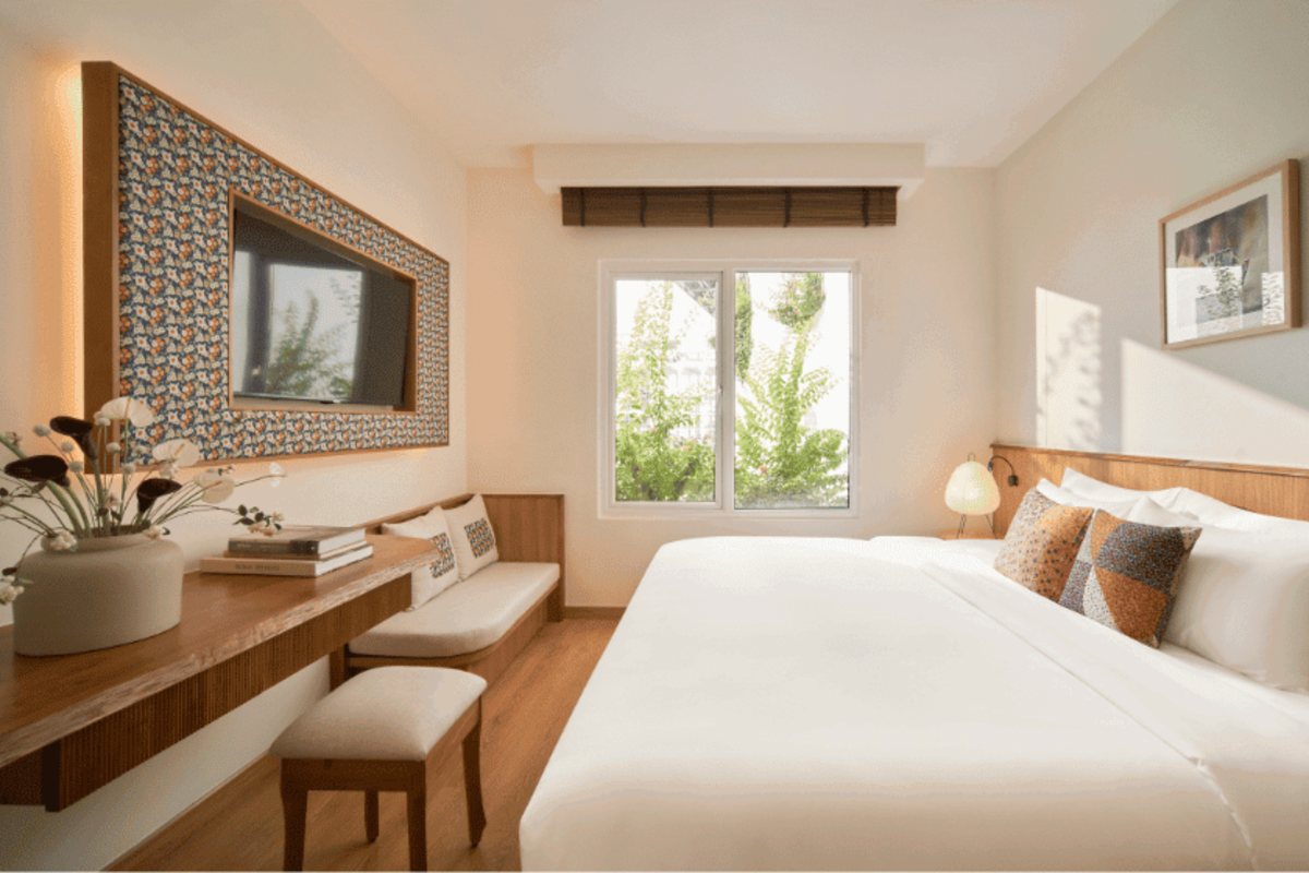 Sunshine Garden room with large window at Silverland Ben Thanh
