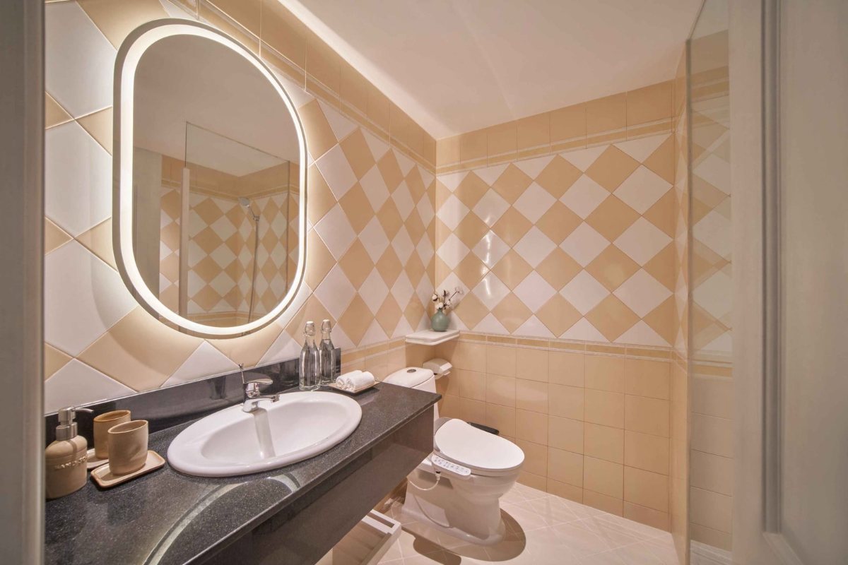 Khaya room bathroom with bathtub at Silverland Mây Hotel