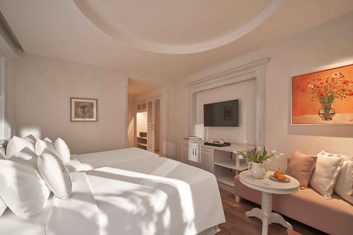 Bed in the Khaya room at Silverland Mây Hotel