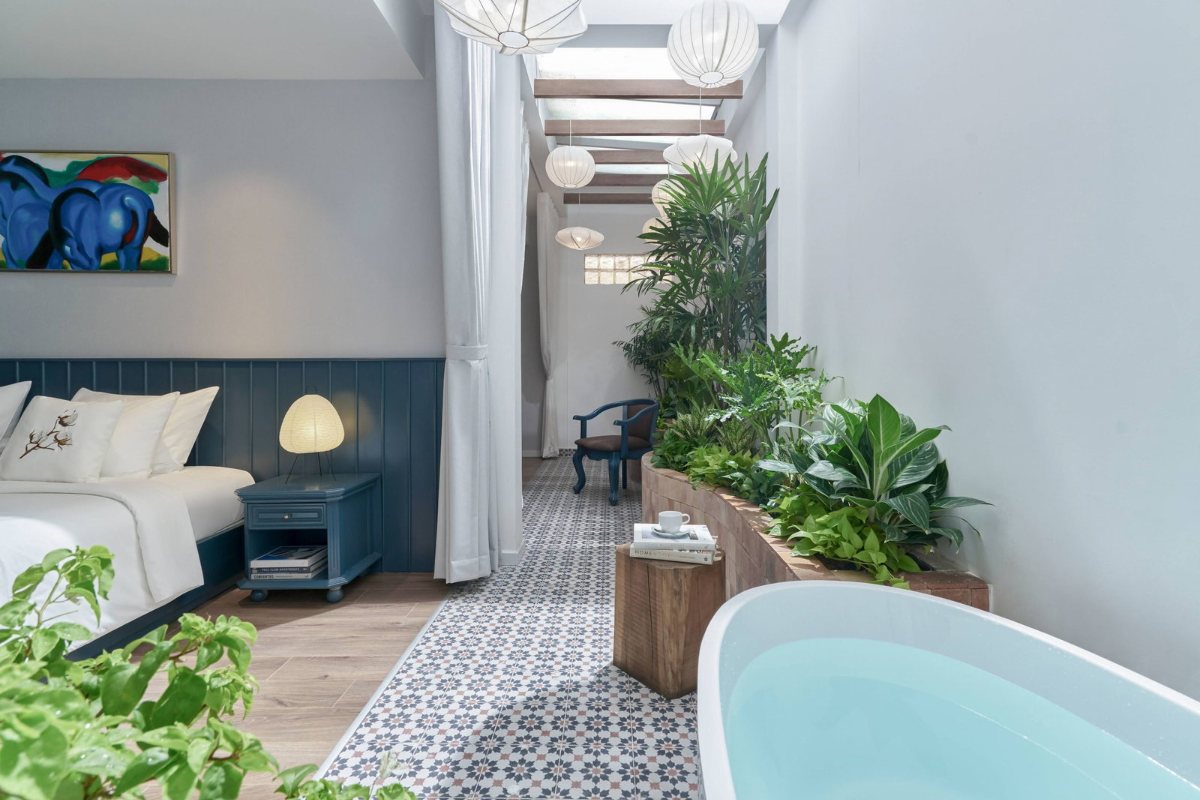 Bedroom of The Suite Family at Silverland Mây Hotel