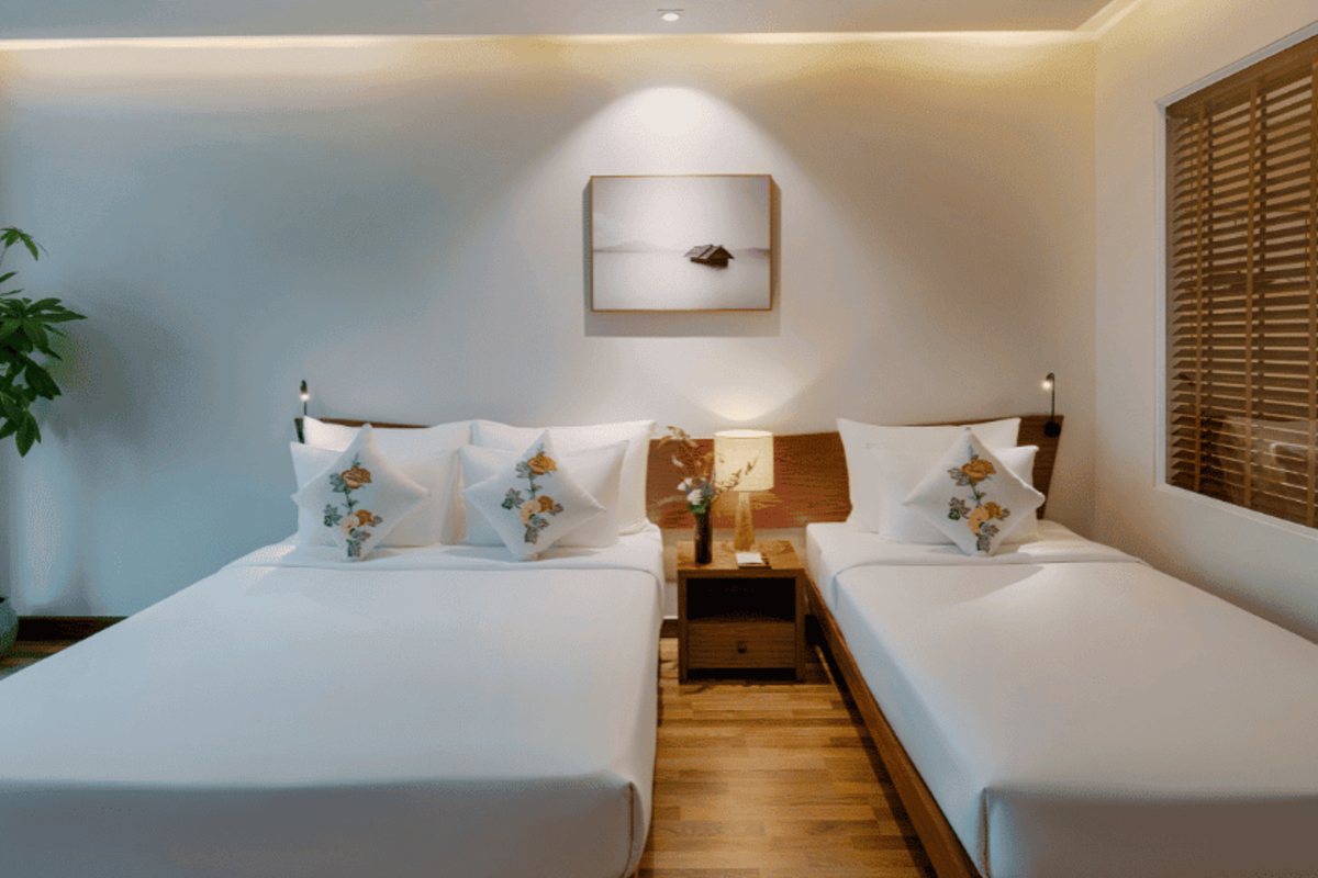 Beds in the Min Suite at Silverland Min Hotel