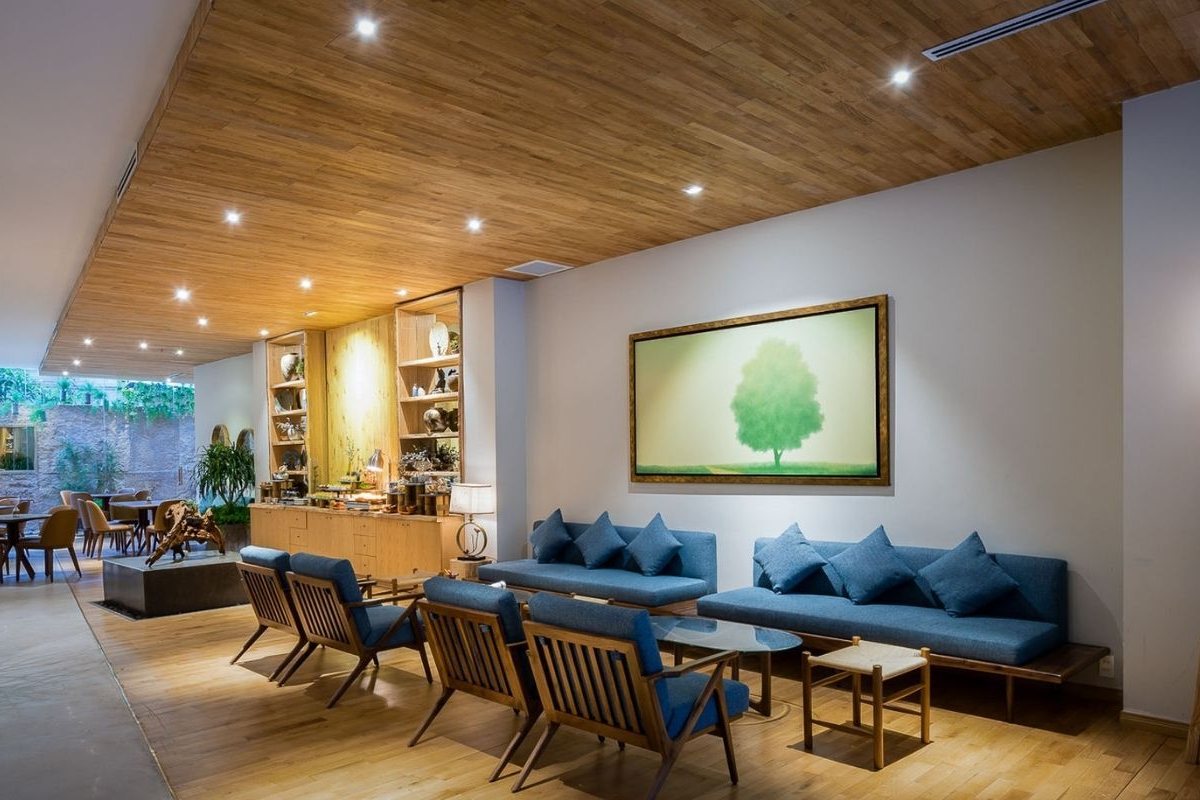 Lobby lounge with wooden ceiling at Silverland Yen Hotel