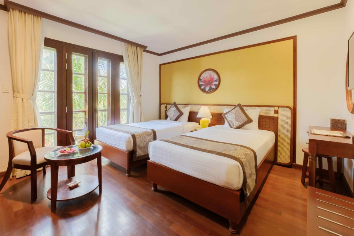 Bed in the Deluxe Cozy room at Sunny Beach Resort & Spa
