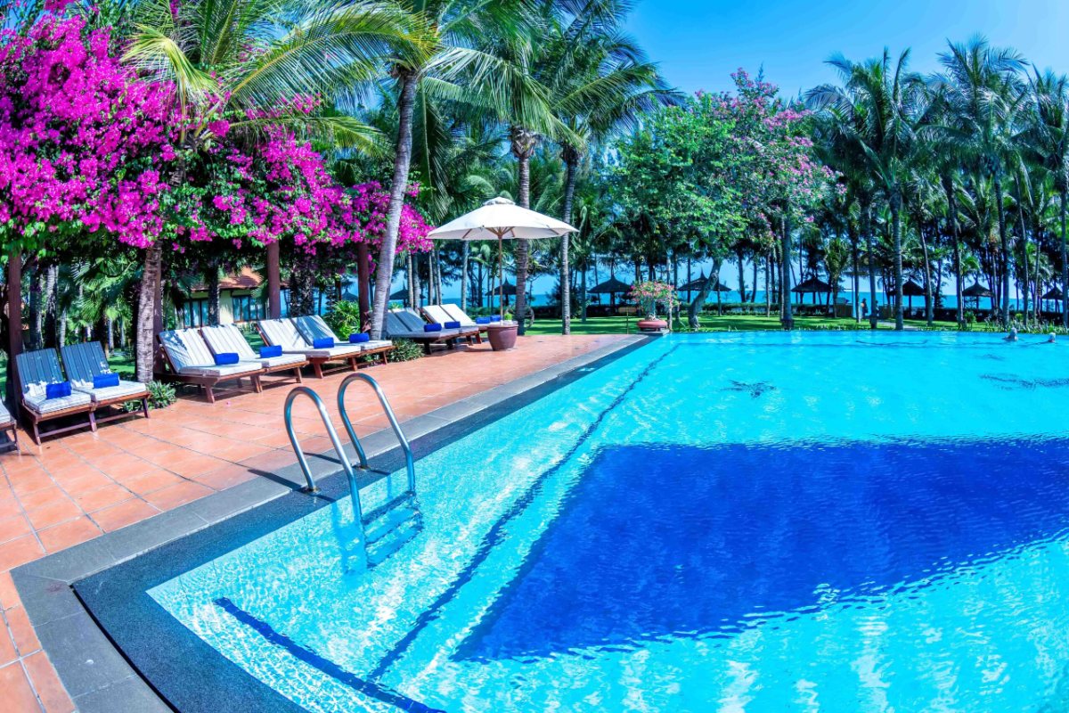 Pool with bougainvillea at Sunny Beach Resort & Spa