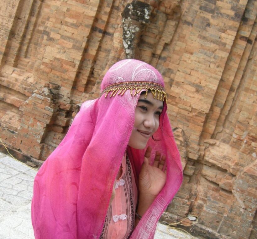 Muslim People in Vietnam 2026: Who Are Vietnamese Muslims? Cham Islam, Bani & Communities Cham woman in traditional dress and headscarf, Vietnam